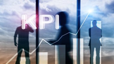 KPI - Anahtar Performans Göstergesi. İş ve teknoloji kavramı. Çoklu maruz kalma, karışık medya. Bulanık arka planda mali konsept