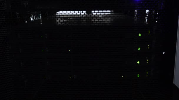 Dark server room flashing green lights — Stock Video