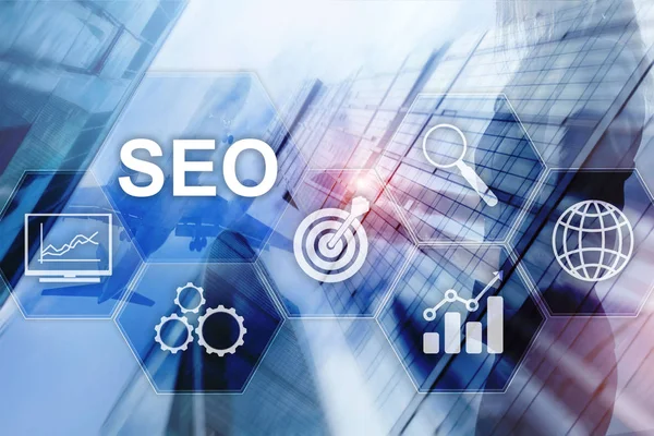 SEO - Zoekmachine optimalisatie, Digitale marketing en internet technologie concept op wazige achtergrond — Stockfoto