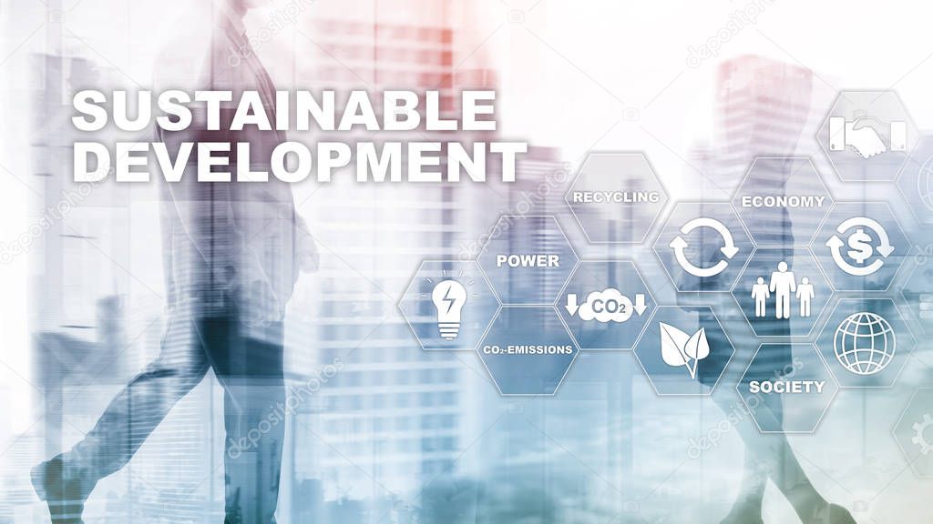 Sustainable development, ecology and environment protection concept. Renewable energy and natural resources. Double exposure of success businessman with abstract building