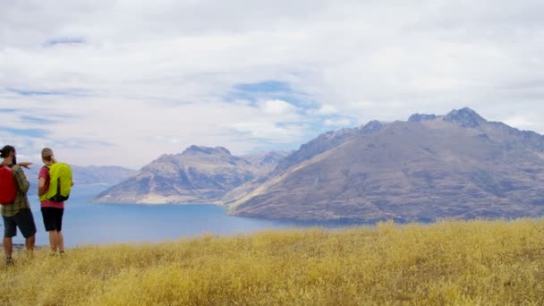 Young Healthy Caucasian Male Female Rucksacks Trekking Landscape Mount Aspiring — Stock Video