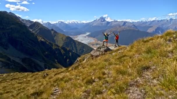 Aerial Drone Active Young Caucasian Couple Celebrating Achievement Goal Top — Vídeo de stock