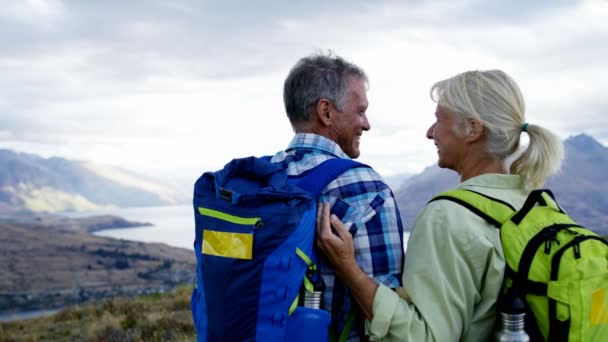 Loving Caucasian Male Female Seniors Trekking Keep Fit Mount Aspiring — Stock Video