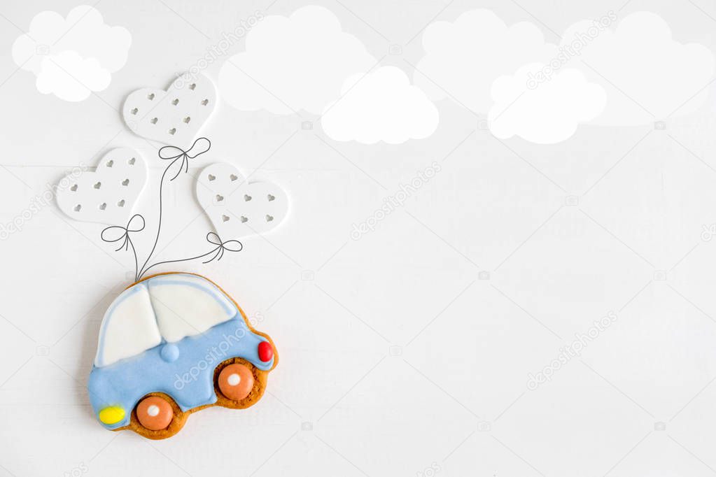 A photo of a typewriter flying on balloons. Greeting card for children, newborns. Children's banner.