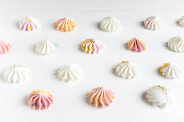 Pattern Meringues White Wooden Background Multicolored Meringues White Background Basis — Stock Photo, Image
