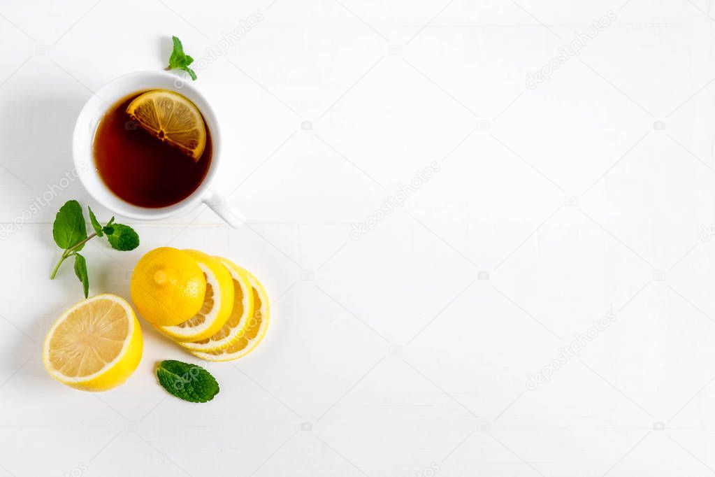 Background for banner with lemon mint and black tea seagull. Black tea with lemon. Background for banner with tea and lemon