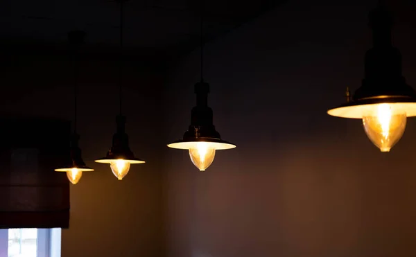 Lighting for a nice cozy cafe. Dim light in the room. Romantic light in the room. — Stock Photo, Image