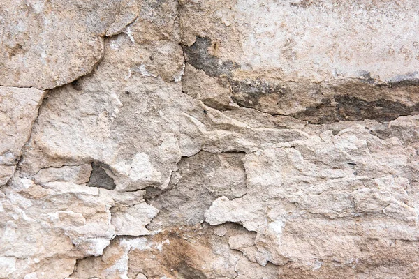 Textur der Steinmauer für das Design. Foto von Stein Felsen Textur. Basis für Banner, strukturierte Website aus Stein. — Stockfoto