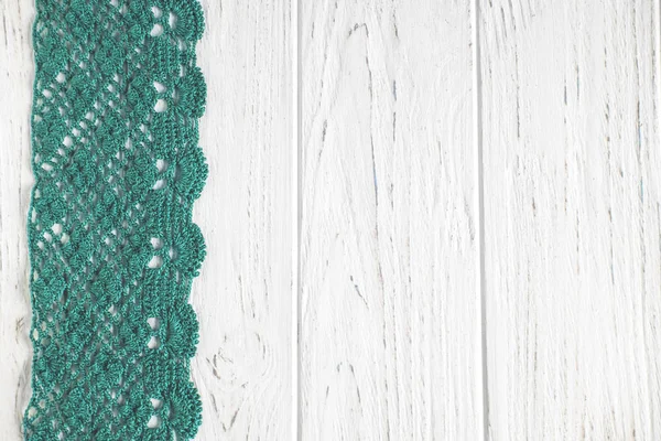 Background for greeting card with lace. Wooden background with knitted lace. Frame for text with lace. Needlework, holidays, greetings, wedding — Stock Photo, Image