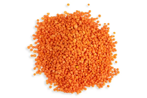 Fatia de lentilhas vermelhas secas foto de cima isolado em um fundo branco. Lentilhas isoladas — Fotografia de Stock