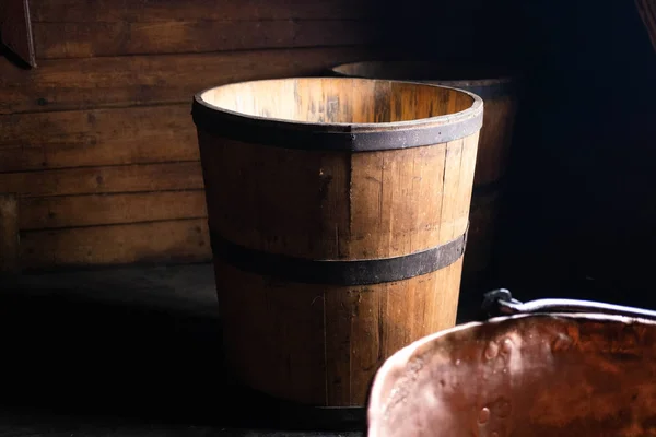 Wooden tub for milk, water. Kadka which is used in the traditional production of hard cheese in Ukraine. Traditional cheese making tools . Kadka which is used in the traditional production