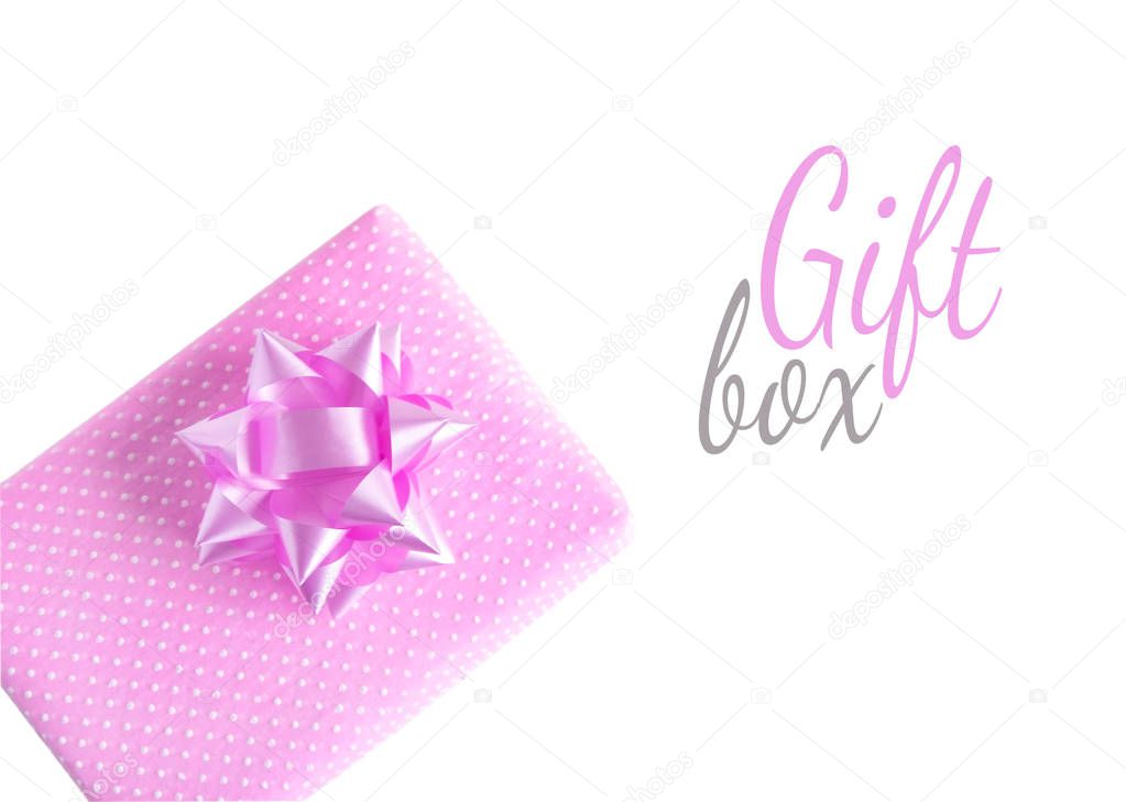 Gift box of pink color isolated on a white background. Gift box for banner design. View from above