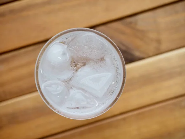 Ice water in a glass cup