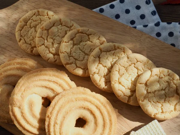 Butter cookies, chocolate cookies, coffee and maple leaves