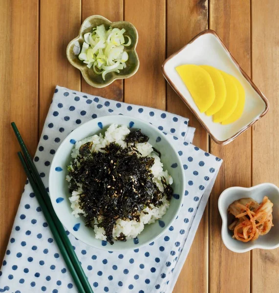 Korean food laver powder White rice and Kimchi and Pickled radish