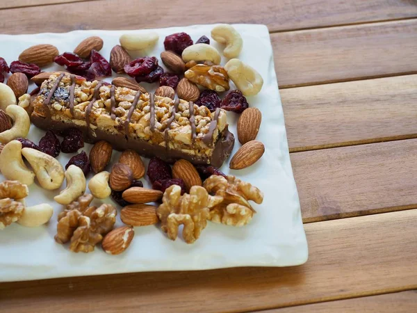 Chocolate bar and nuts, Almonds, walnuts, raspberries, Cashew nut