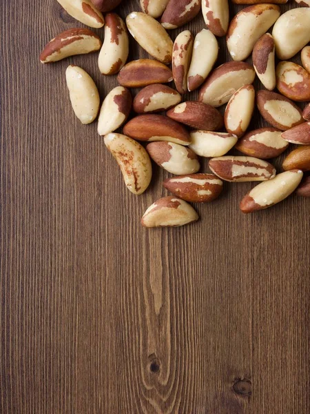 Brazil nuts on wooden boards, nuts