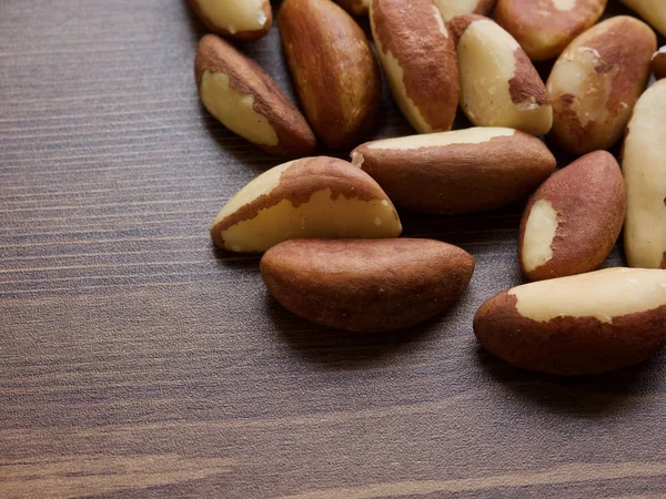 Brazil nuts on wooden boards, nuts