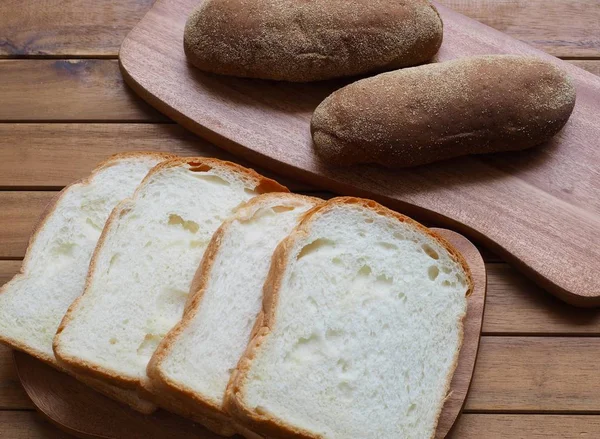 Whole wheat bread and  plain bread