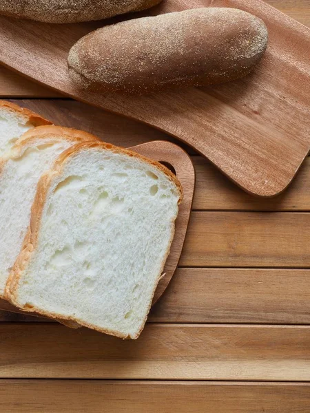 Whole wheat bread and  plain bread