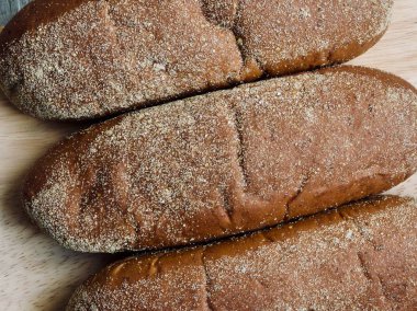 Kahverengi kepekli ekmek arka plan, closeup