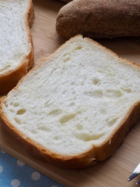 Whole wheat bread and  plain bread