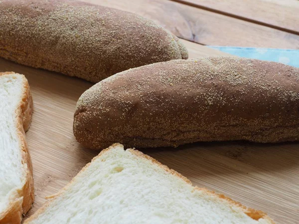 Whole wheat bread and  plain bread