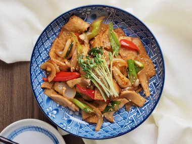 Asian food Stir-fried fish cake vegetables clipart
