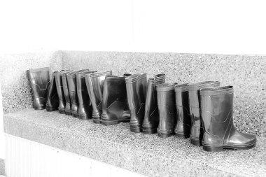 Lined black boots For cleaning clipart