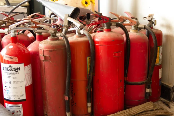 Components of old fire extinguishers Not used Dust and dirt , A symbol of safety from a deadly fire.