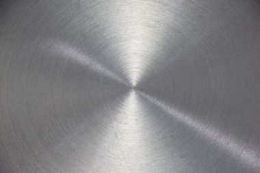 Parlak, paslanmaz çelik zemin arka plandaki güzel ışığı yansıtıyor..