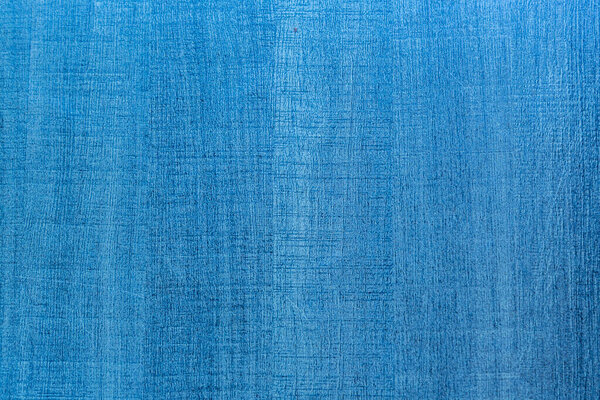 Wall texture and blue wooden background Space for text Use as background or advertising space.