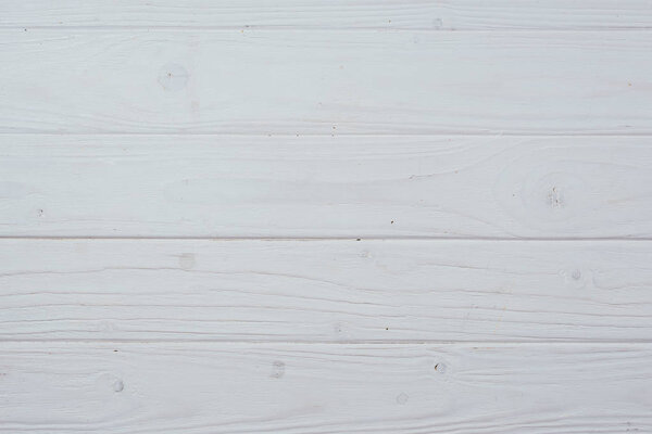 вид сверху на поверхность досок из белого дерева для заднего плана
