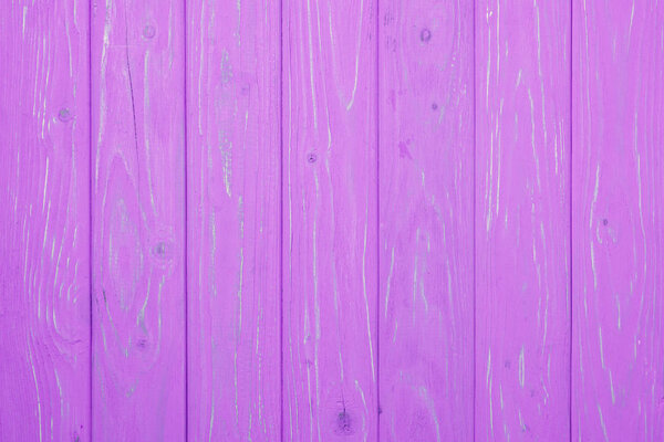 top view of pink vertical wooden planks surface for background