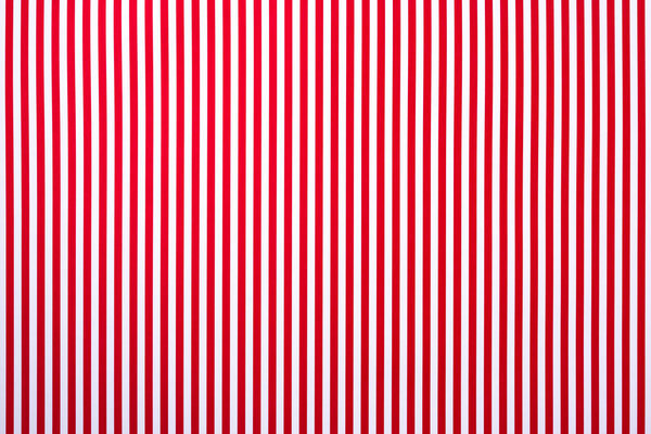 top view of white and red striped surface for background