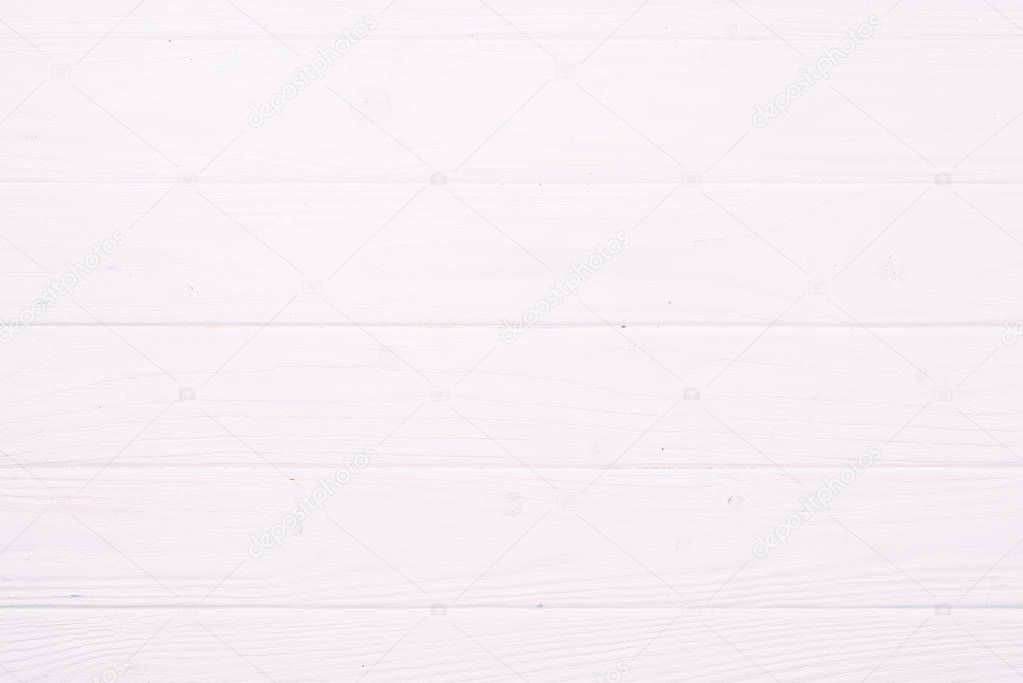 top view of pastel pink wooden planks surface for background