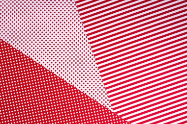 top view of red and white colors abstract composition with polka dot pattern for background