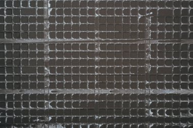 top view of black plastic grid for background clipart