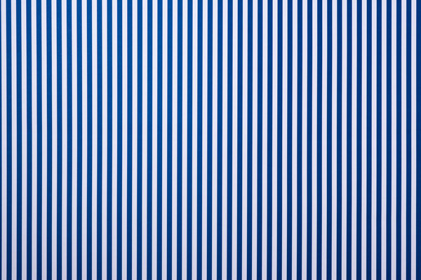 top view of white and blue striped surface for background
