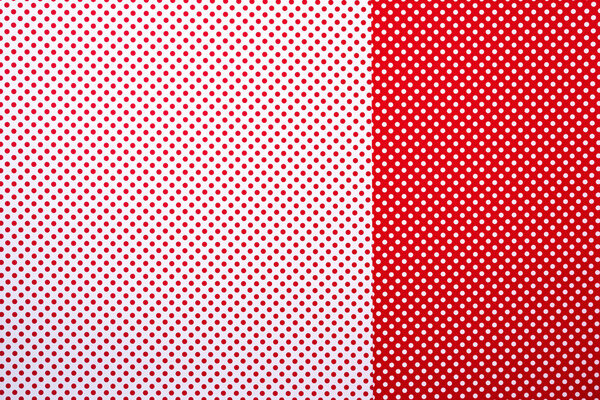 top view of red and white surface with polka dot pattern for background