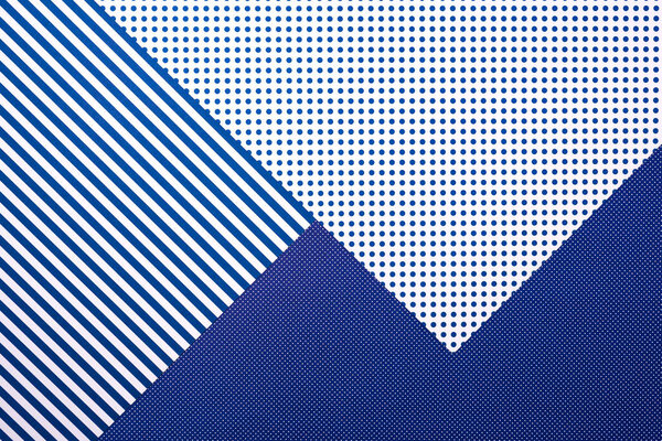 top view of abstract blue composition with stripes and dots for background