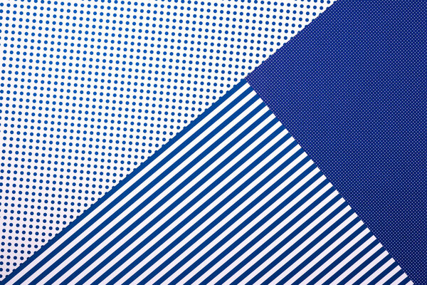 top view of artistic blue composition with stripes and dots for background