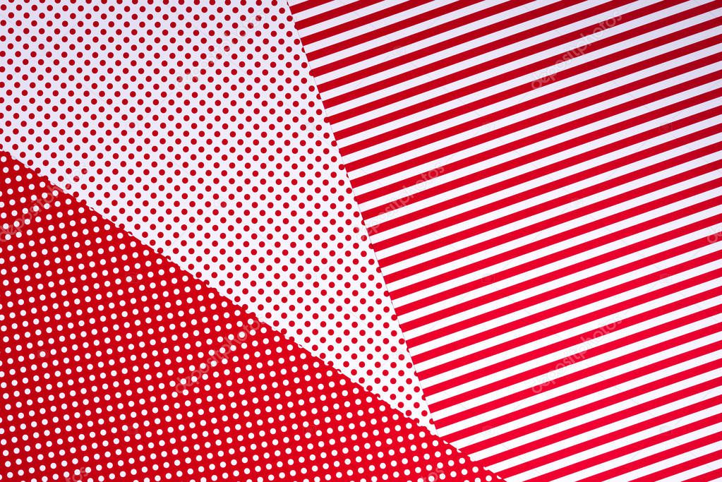 top view of red and white colors abstract composition with polka dot pattern for background