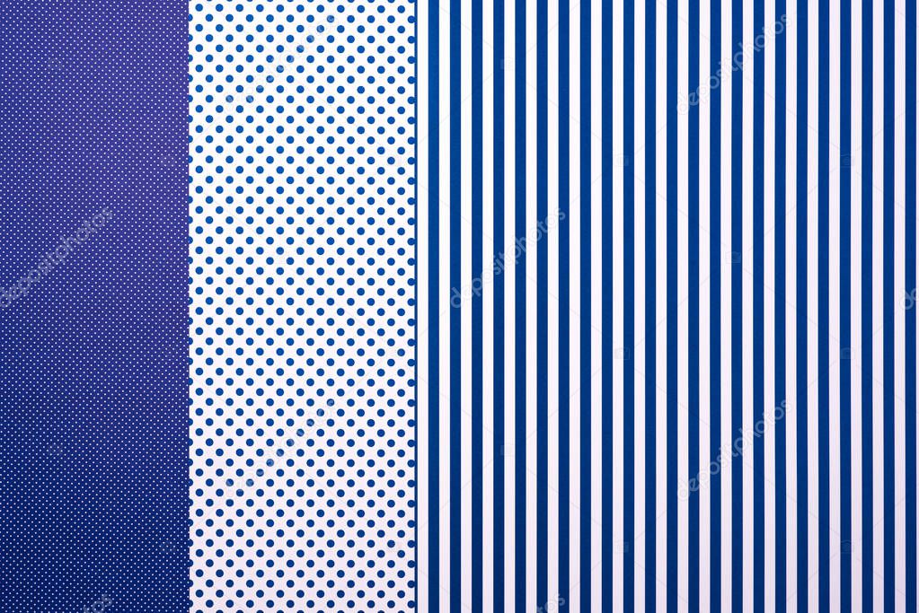 top view of blue composition with stripes and dots for background