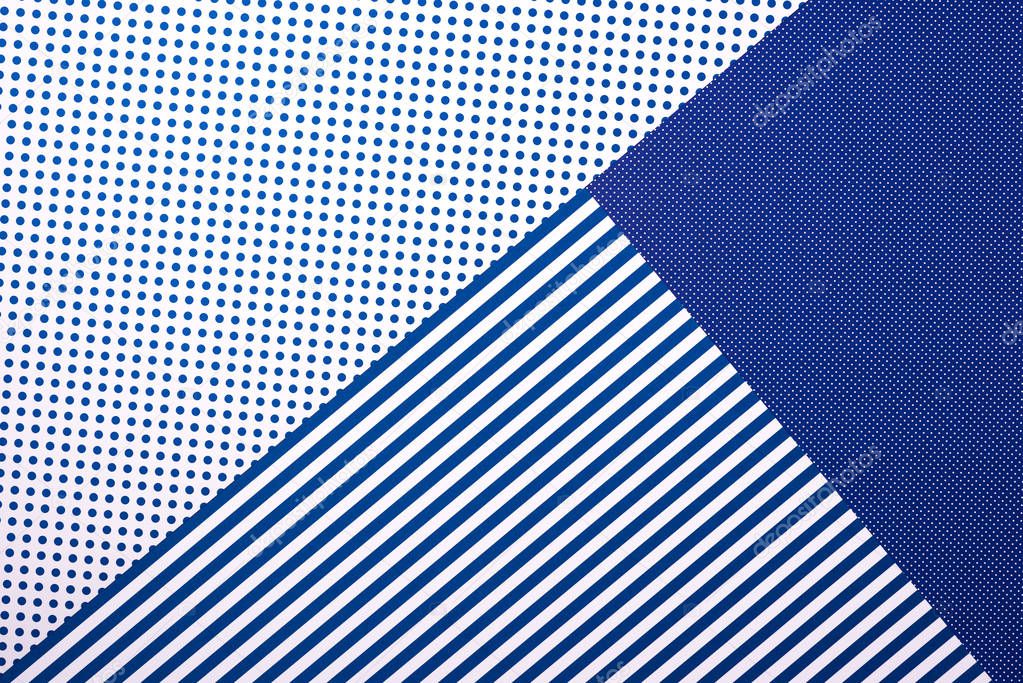 top view of artistic blue composition with stripes and dots for background