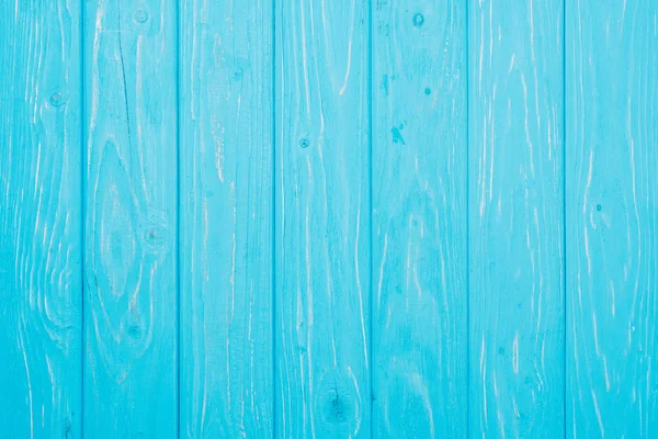 Верхний вид вертикальной ярко-голубой поверхности деревянных досок для заднего фона — стоковое фото