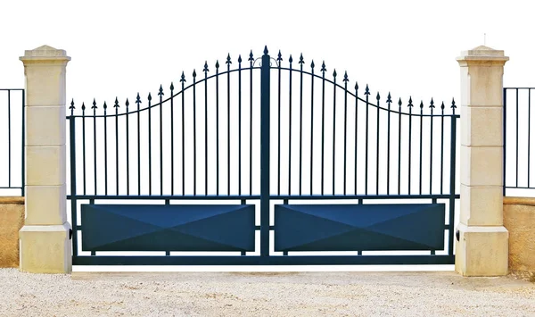 Blue metal gate with stone pillars