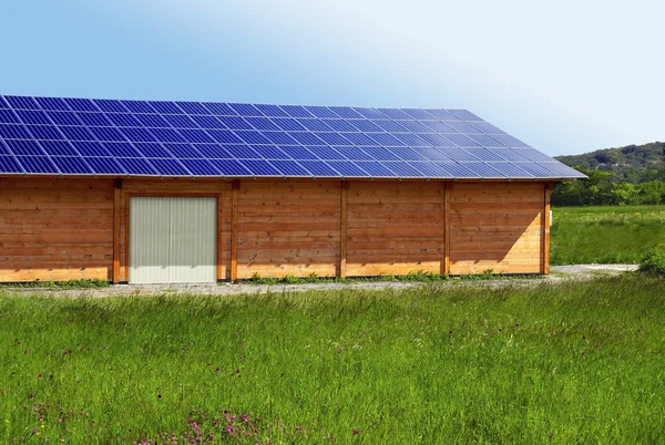 Wooden shed with roofing solar panels.