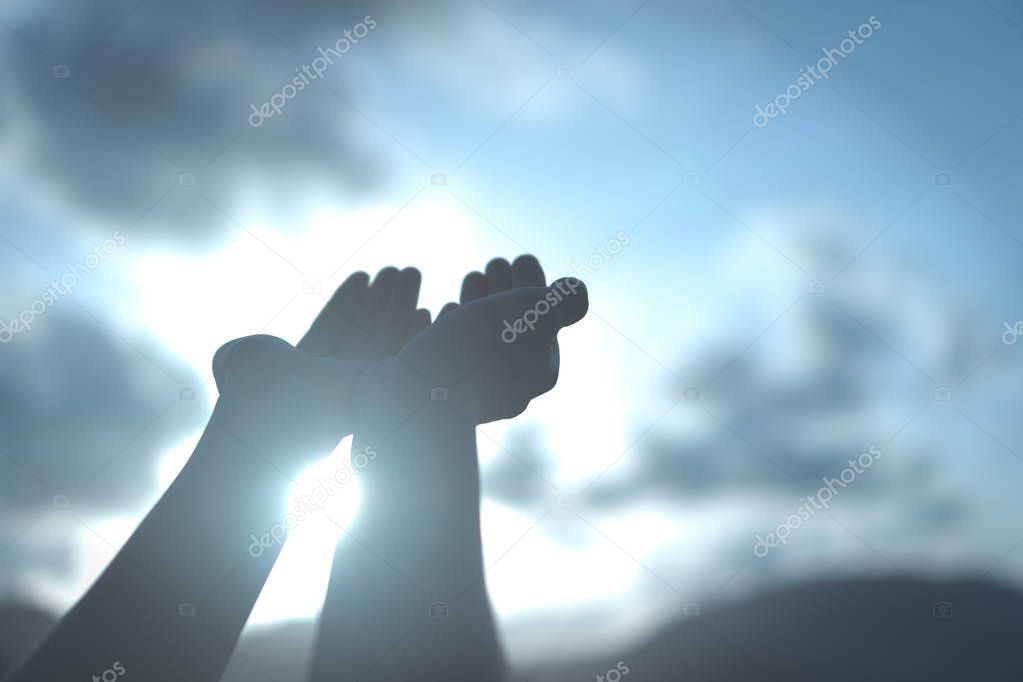 Woman hands place together like praying in front of nature green  background.