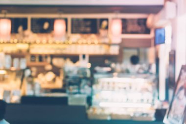 Kahve Cafe müşteriler arka plan vintage tonu renk stili ile bulanıklık.